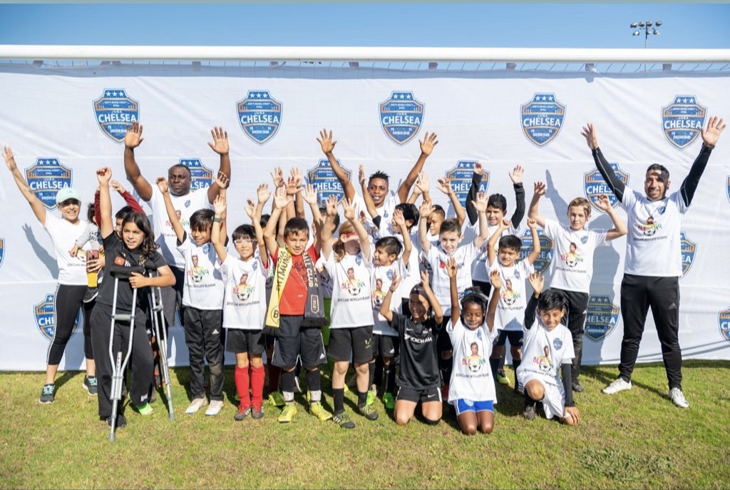 Players celebrate together after an activity
