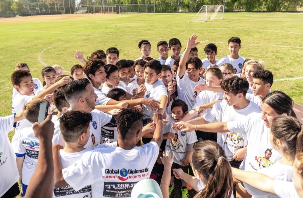 Players join together for a team huddle