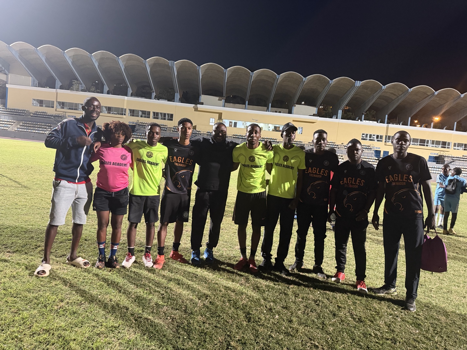 Footballers posing together on the field