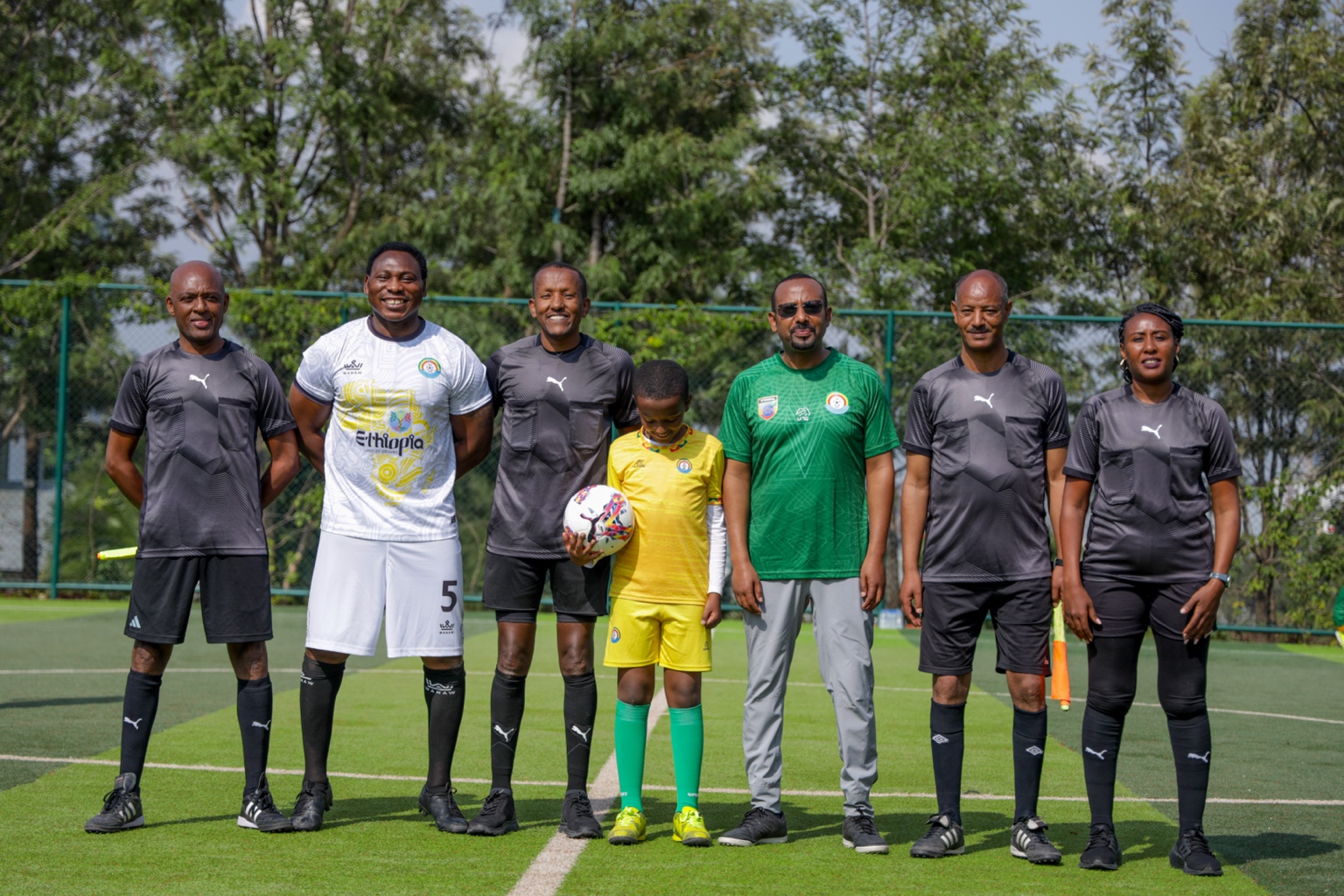 Participants and guests sharing a moment during the Ethiopia football gathering
